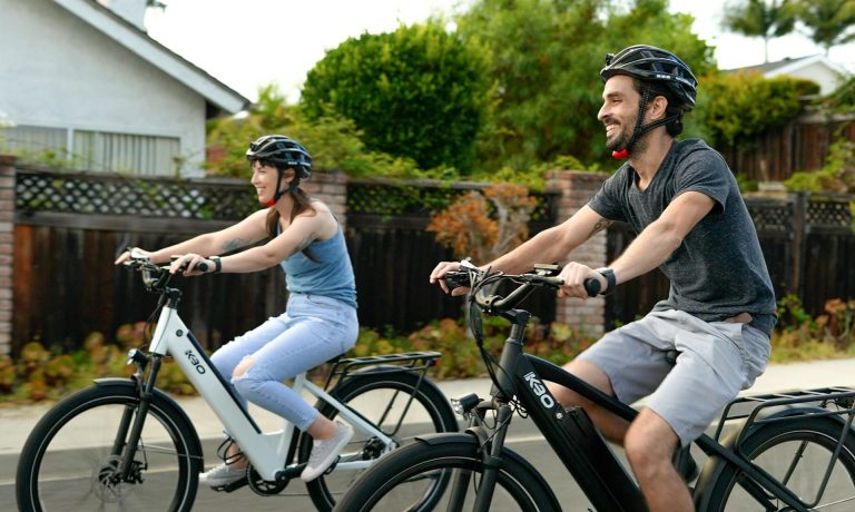 couple biking along the Gold Coast of Connecticut
