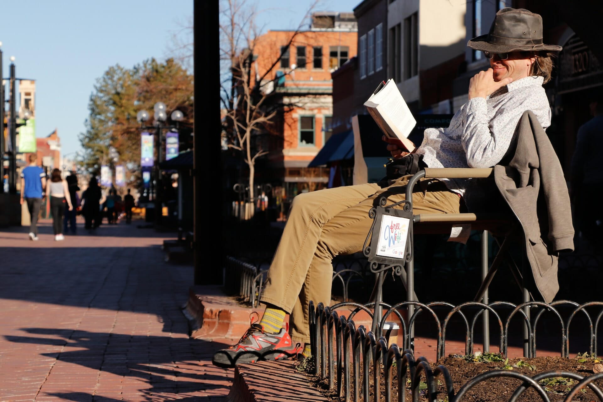 man sitting on beekman avenue during the sleepy hollow street fair