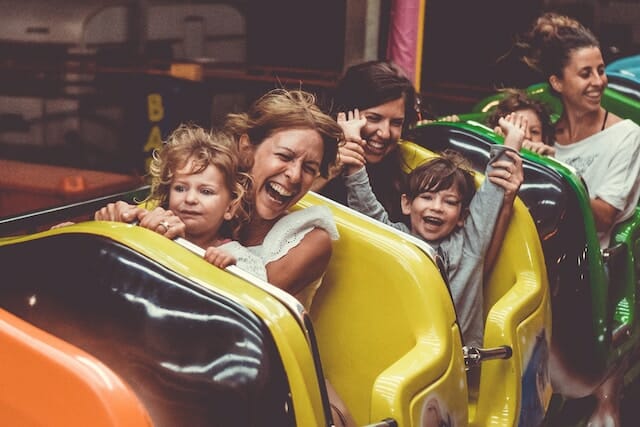 families riding a roller coaster at Rye Playland in Rye, New York