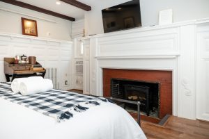 Desk/workspace next to the antique fireplace in Room 3
