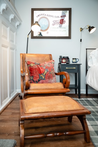Leather chair and ottoman in Room 3