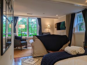 room 1 from bed towards sitting area Queen Bed with Private Entrance: Room 1