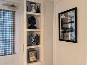 room 1 knick knacks shelves Queen Bed with Private Entrance: Room 1