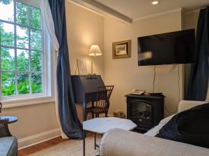 room 1 sitting area from entrance Queen Bed with Private Entrance: Room 1