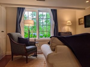 room 1 sitting area towards window Queen Bed with Private Entrance: Room 1