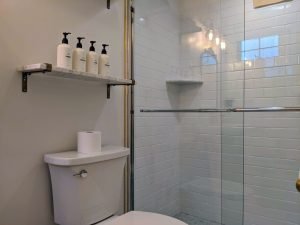 room 2 bathroom toilet shower Private Entrance, King Bed, Close to Pool: Room 2