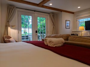 room 2 bed towards closed door Private Entrance, King Bed, Close to Pool: Room 2