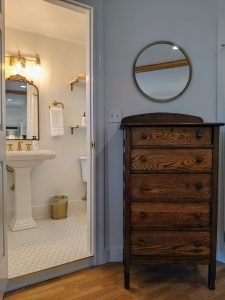 room 2 dresser bathroom light Private Entrance, King Bed, Close to Pool: Room 2
