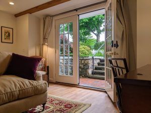 room 2 from bathroom towards couch open door Private Entrance, King Bed, Close to Pool: Room 2