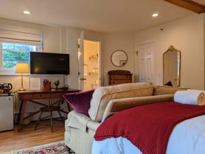 room 2 from door towards couch bathroom Private Entrance, King Bed, Close to Pool: Room 2