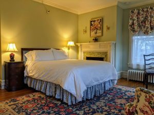 Historic Room With Queen Bed And Spacious Bath: Room 26 9 room 26 bed scaled 1 Historic Room with Queen Bed and Spacious Bath: Room 26