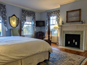 Historic Guest Room With A King Bed | Room 27 4 room 27 from doorway fireplace scaled 1 Historic Guest Room with a King Bed | Room 27
