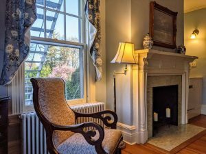 Historic Guest Room With A King Bed | Room 27 8 room 27 rocking chair view scaled 1 Historic Guest Room with a King Bed | Room 27