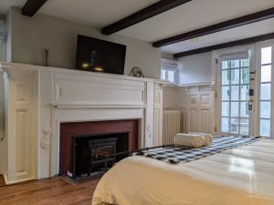 room 3 fireplace Historic King Bed with Private Entrance: Room 3