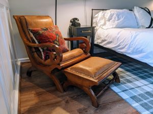 The chair is both leather, and very comfortable