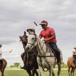 polo players playing at Greenwich Polo Club