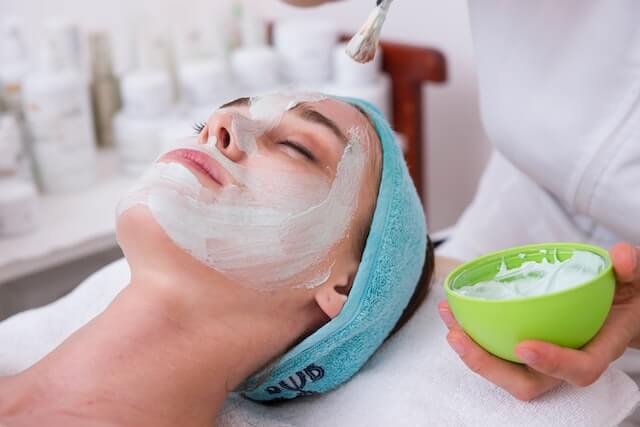 woman receiving a facial treatment at one of the best spas in Greenwich CT
