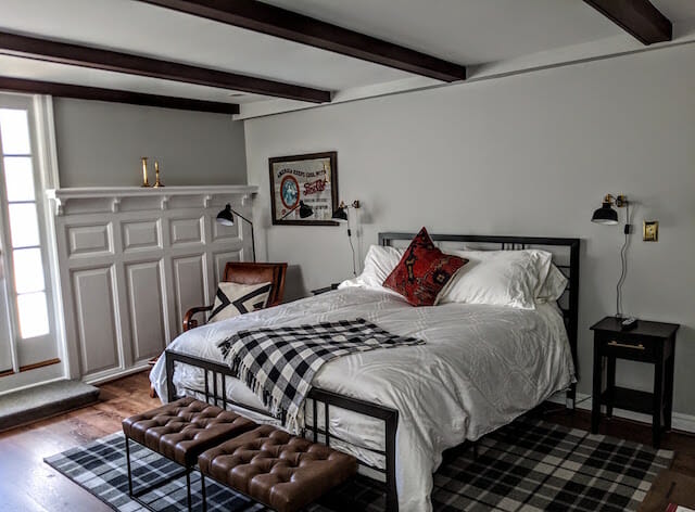 view of the bed surrounded by paneling in Room 3