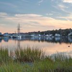 sunset over Mystic Seaport and the Charles W Morgan, one of the best things to do in Mystic CT
