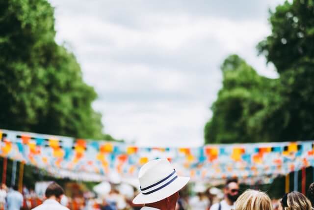 man wearing a hat at one of the best outdoor summer festivals in CT
