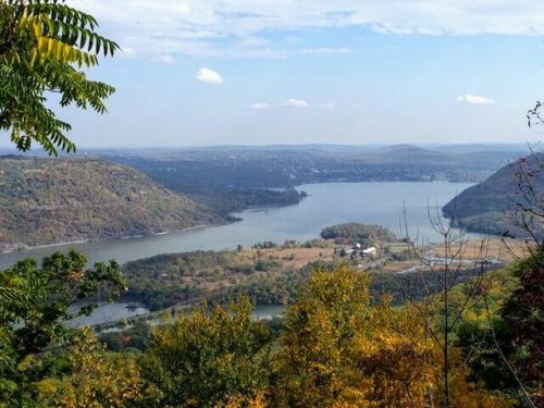 view from the top of bear mountain state park, overlooking the hudson river