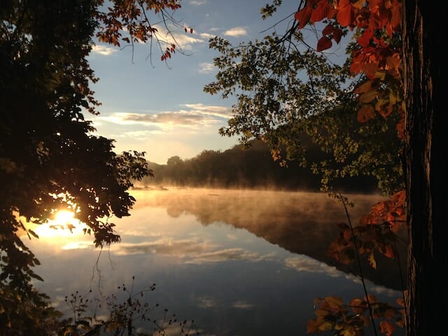 mist rising from a lake in the fall