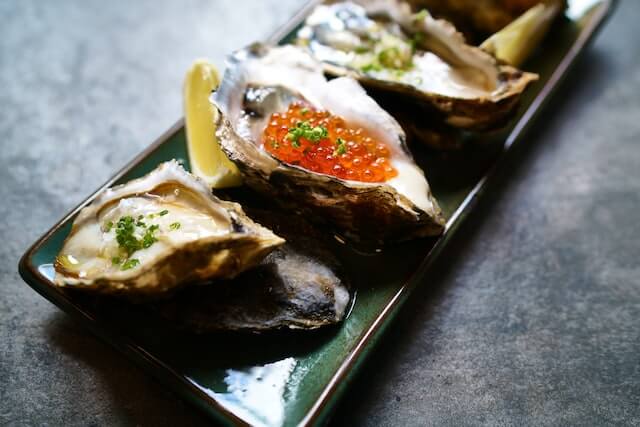 plate of raw oysters at the international food court at the norwalk oyster festival