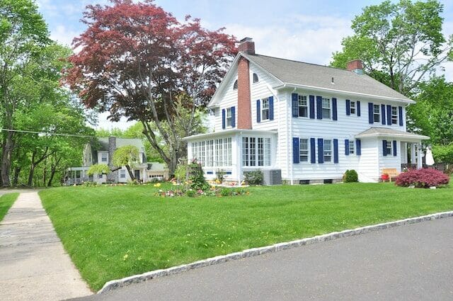 A cozy bedroom at the gay bed and breakfast in New England, featuring a comfortable bed and warm decor.