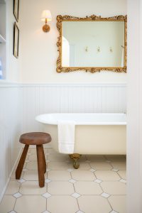 The clawfoot tub in Room 20, also known as the Brush Suite