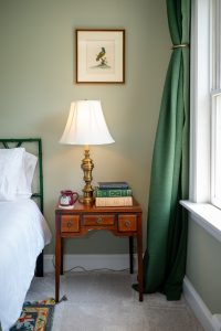Nightstand by the window in Room 12