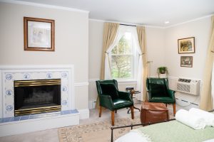 Room 14 fireplace seating area Private Entrance, Fireplace, King Bed: Room 14