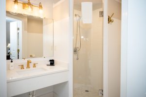 Sink and shower in the Sackett Suite