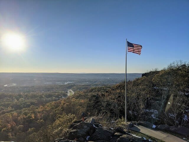 American flag next to a scenic view in Cheshire, CT