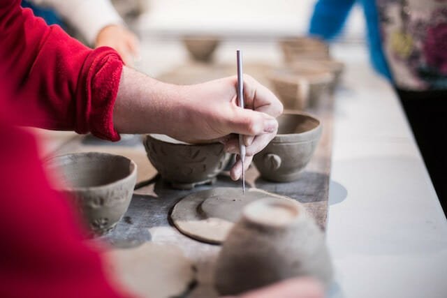 Pottery-making event with helpful instruction