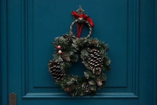 Handmade wreaths on doors scream the holidays, like a wood burning stove while you sip hot chocolate