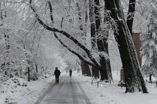Enjoying the winter season by walking along main street at one of the best winter getaways in New England