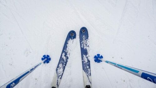 Skis and ski poles in the fresh snow at Camelback Mountain