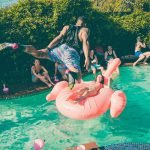Gay Resorts New York: Top 23 Most Unique Spots 14 A group of friends having a good time in the party atmosphere at the pool