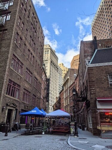 Cobblestone streets of Stone Street, one of the most historic streets in the Financial District NYC
