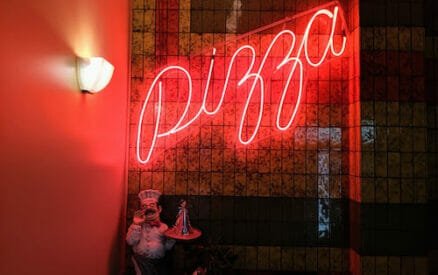 Pizza sign at Roma Restaurant