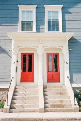 Double red doors on a historic building in Salem, MA