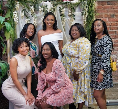 Illustration of a joyful bridal shower celebration with mimosas and drinks in Connecticut