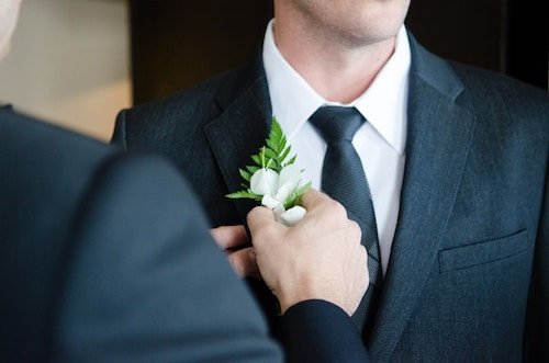 Bed And Breakfast Wedding Venues: Most Unique &Amp; Charming Spot 15 Buttoning a boutonniere on to the groom