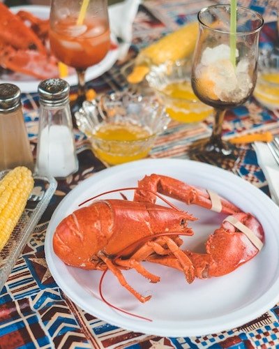 Lobster, served cooked whole or in a lobster roll, is standard fare in Freeport, Maine