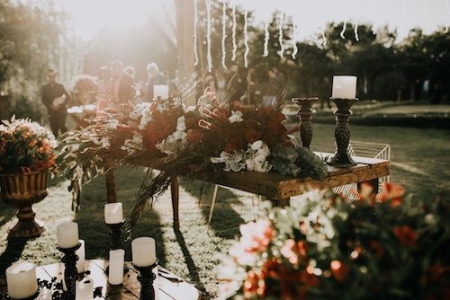 Principal (or head) table at parties and events for the most important person (or couples) at the event