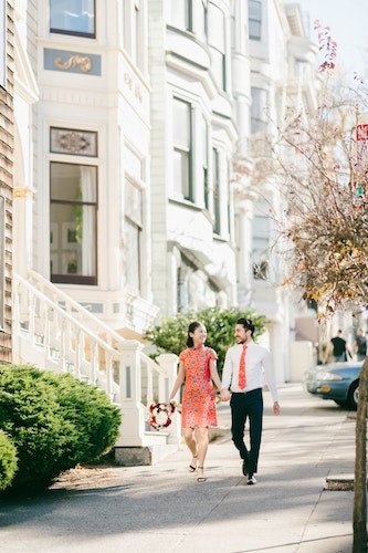 Engagement session walking past the stunning architecture in New Haven