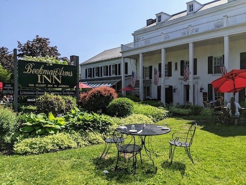 Front of the Beekman Arms Inn, with outdoor seating for the restaurant