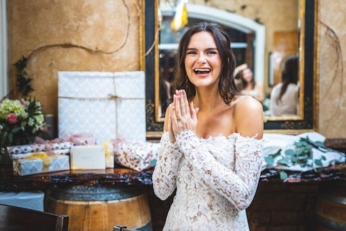 Woman smiling and laughing at one of the best bridal shower venues in CT