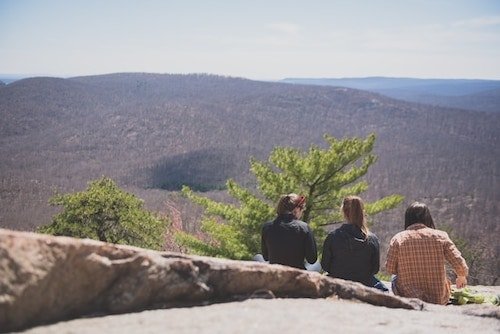 Women pausing to enjoy the view along the Appalachian Trail in Bear Mountain State Park