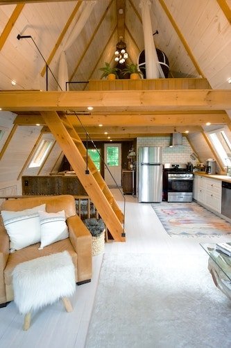 One of the tiny houses with West Elm furniture in Stowe, VT, another glamping destination